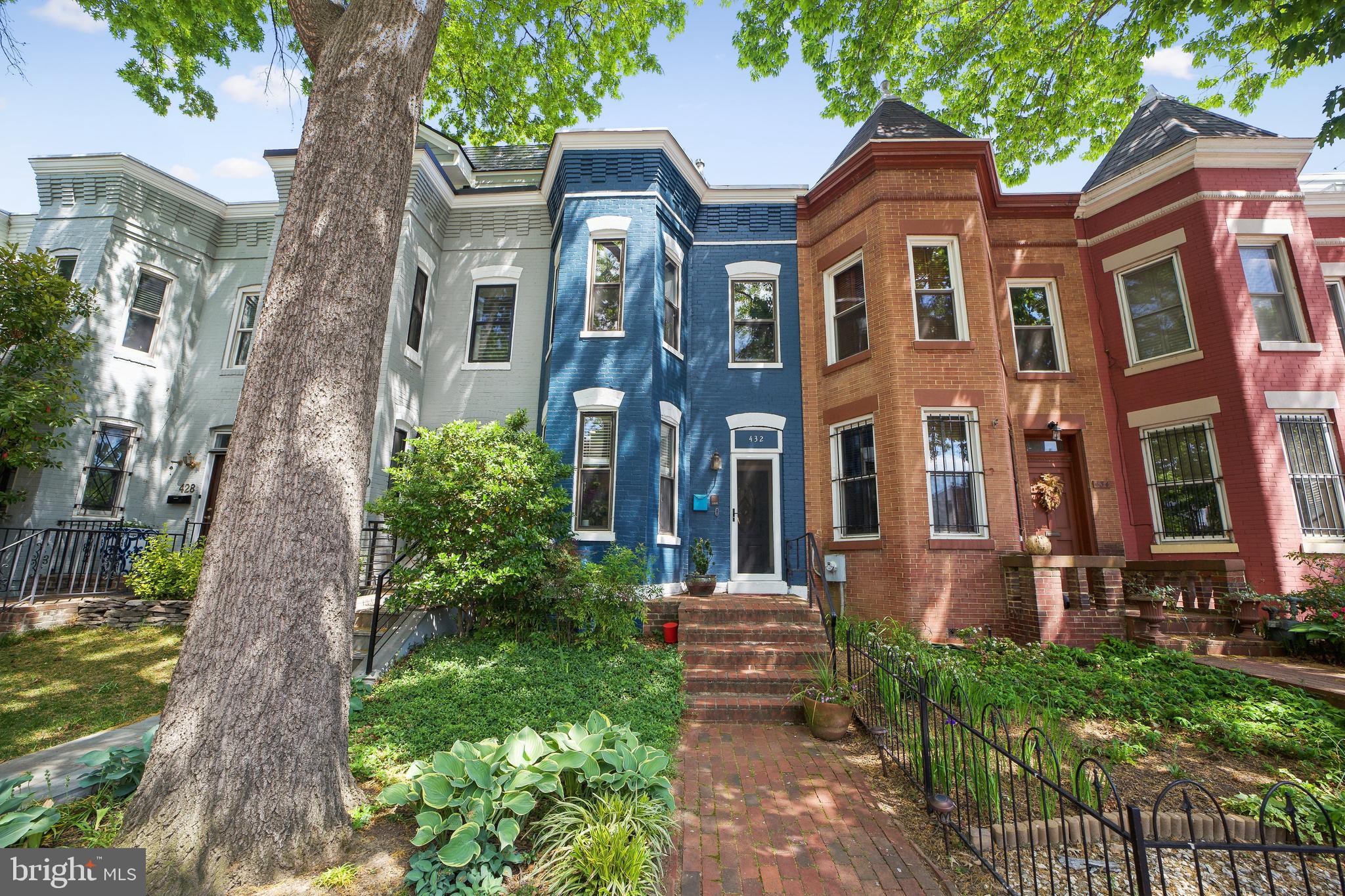 432 15th Street Southeast Washington, DC 20003 - Photo 1 of 26 front view of a brick house with a yard