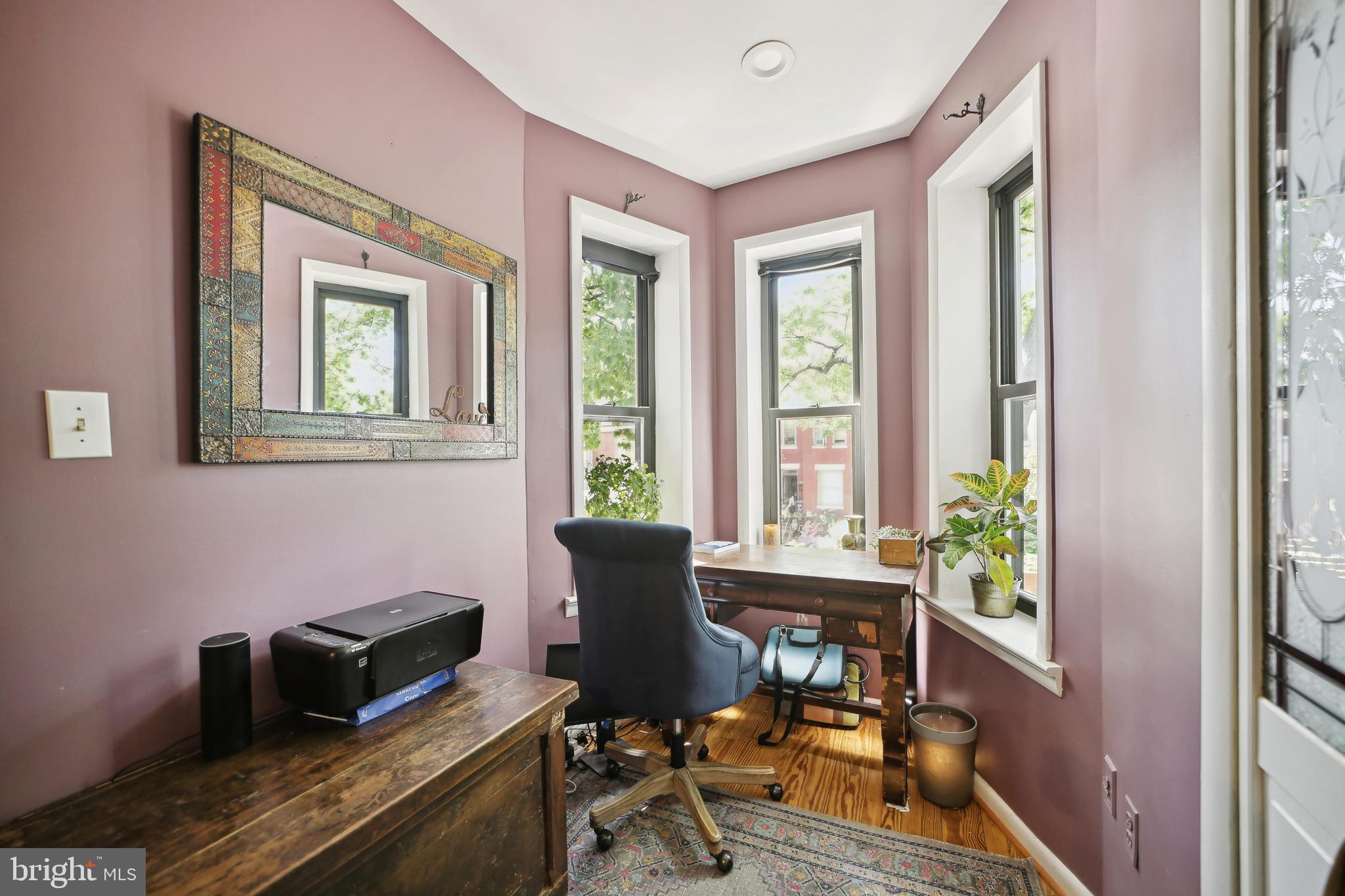 432 15th Street Southeast Washington, DC 20003 - Photo 16 of 26 a livingroom with workspace and a window