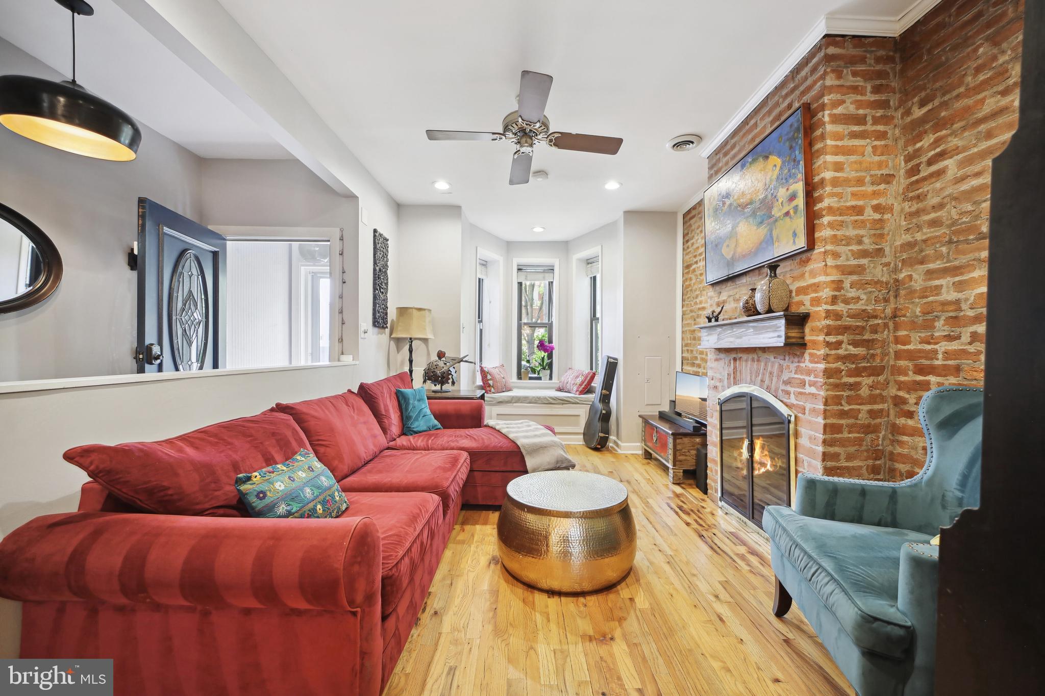 432 15th Street Southeast Washington, DC 20003 - Photo 5 of 26 a living room with furniture and a chandelier