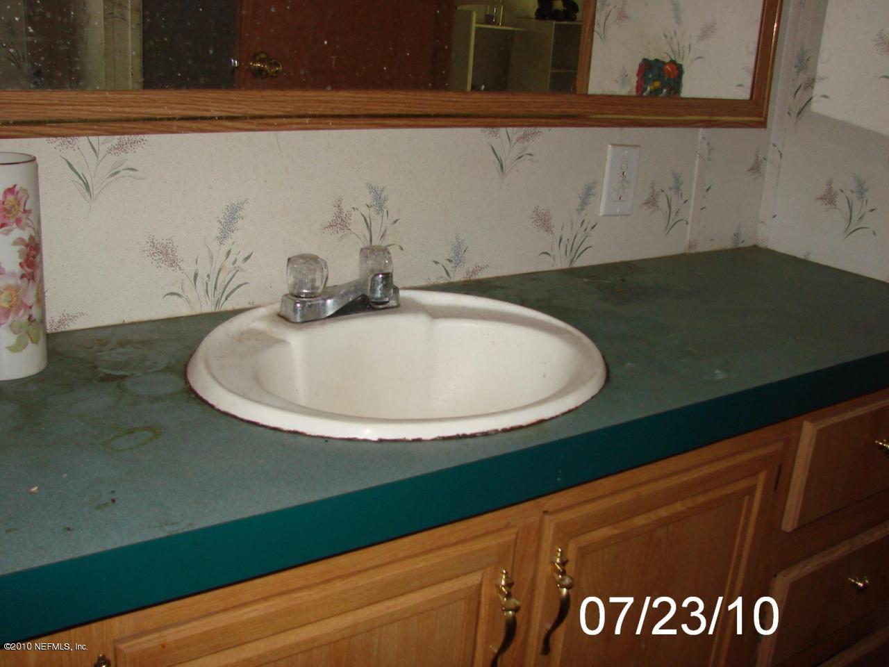 24904 Crawford Road Callahan, FL 32011 - Photo 14 of 25 MASTER BATHROOM VANITY