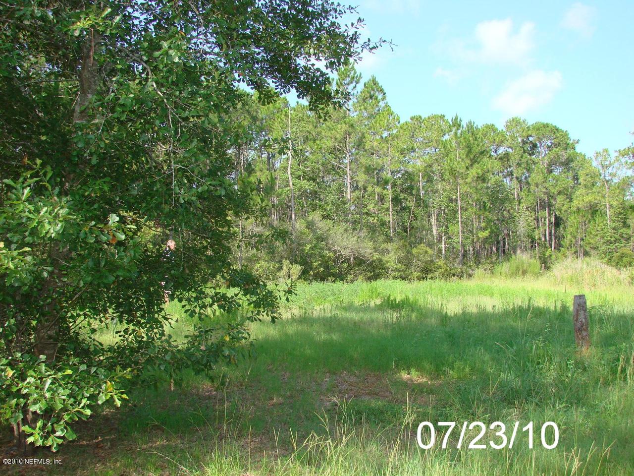 24904 Crawford Road Callahan, FL 32011 - Photo 2 of 25 MORE PRIVACY IN THE BACKYARD
