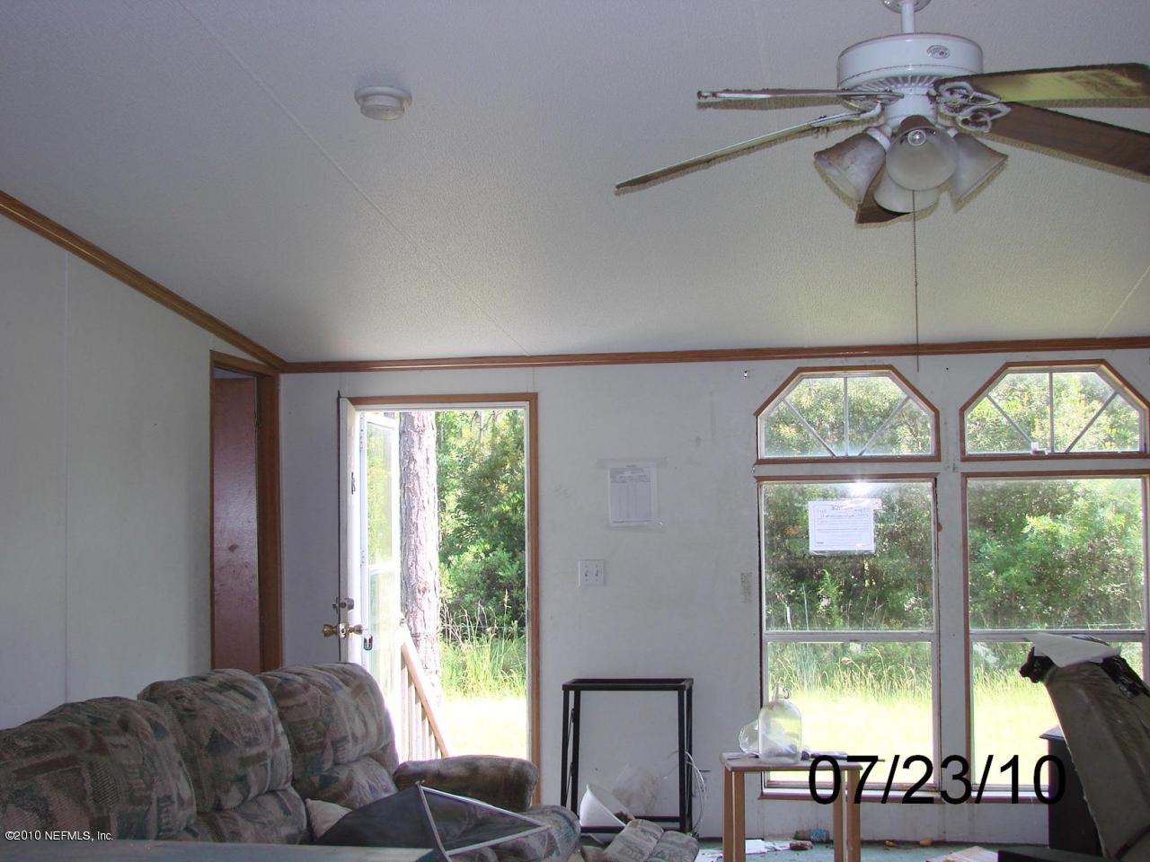 24904 Crawford Road Callahan, FL 32011 - Photo 5 of 25 LIVING ROOM & FRONT ENTRY