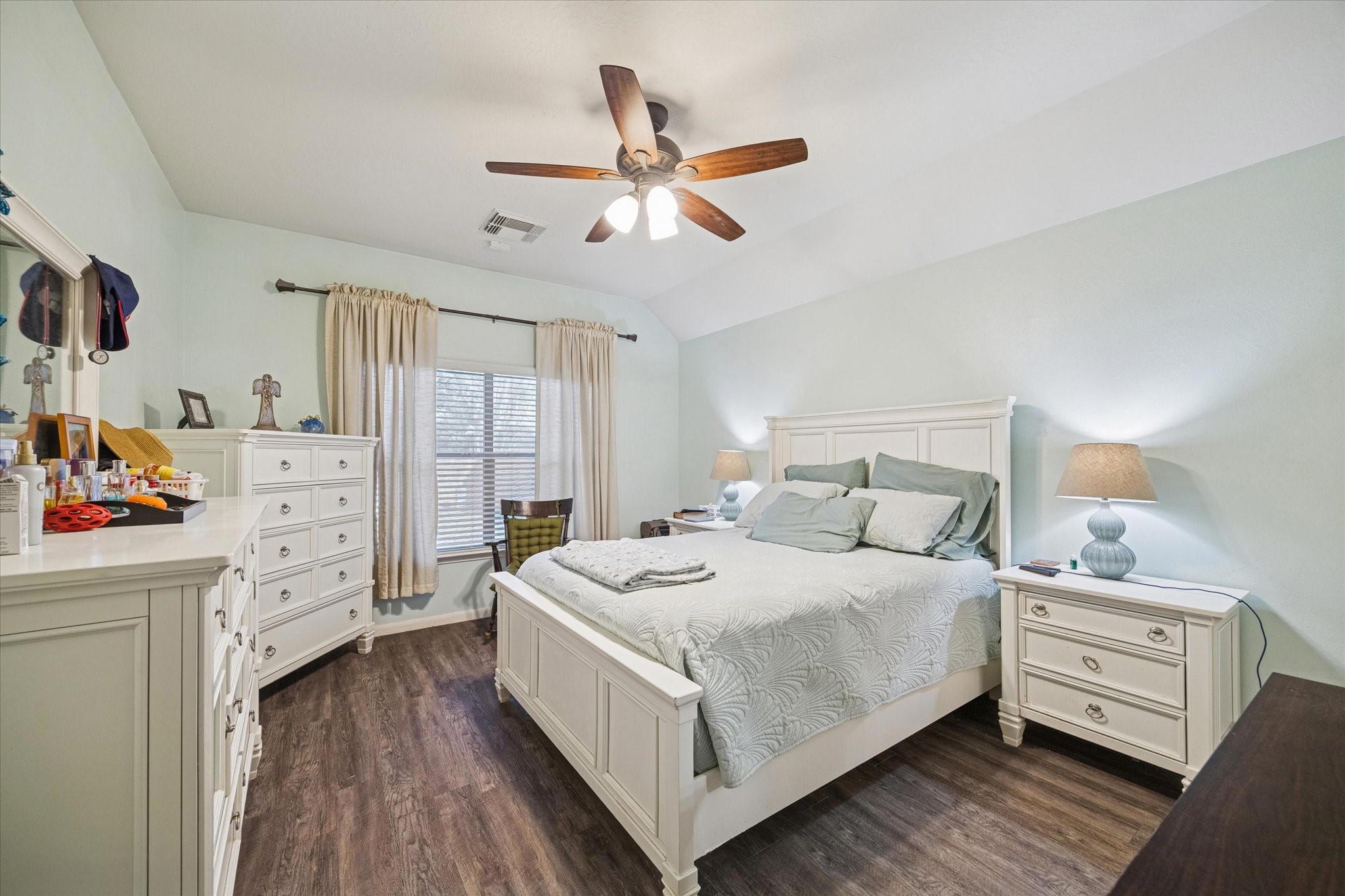 5243 El Tigre Lane Baytown, TX 77521 - Photo 14 of 29 a bedroom with a bed and a dresser