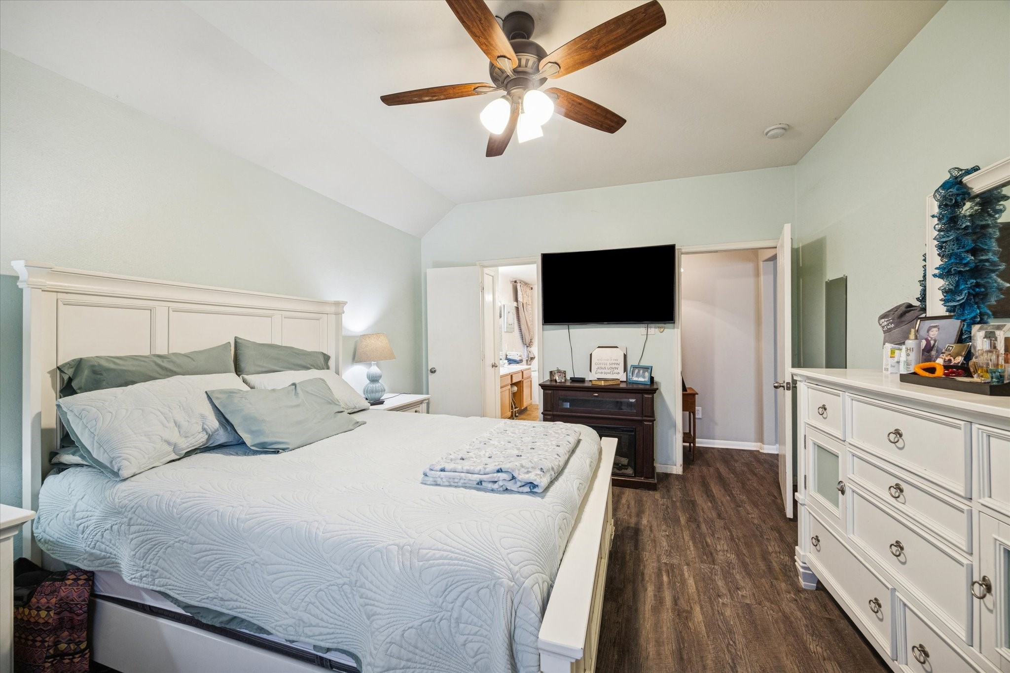 5243 El Tigre Lane Baytown, TX 77521 - Photo 15 of 29 a bedroom with a bed and a flat screen tv