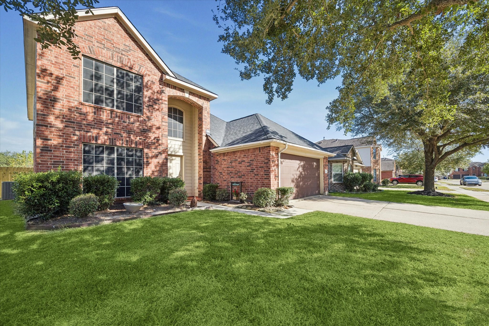 5243 El Tigre Lane Baytown, TX 77521 - Photo 2 of 29 a view of a house with a yard and sitting area