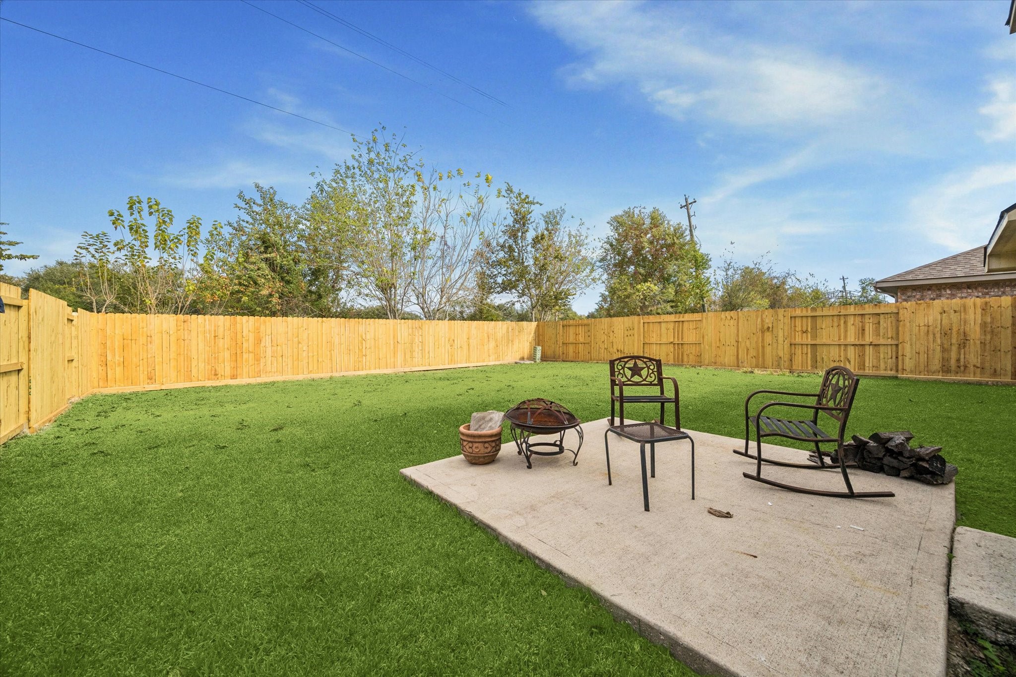 5243 El Tigre Lane Baytown, TX 77521 - Photo 28 of 29 a view of a chairs and table in the garden