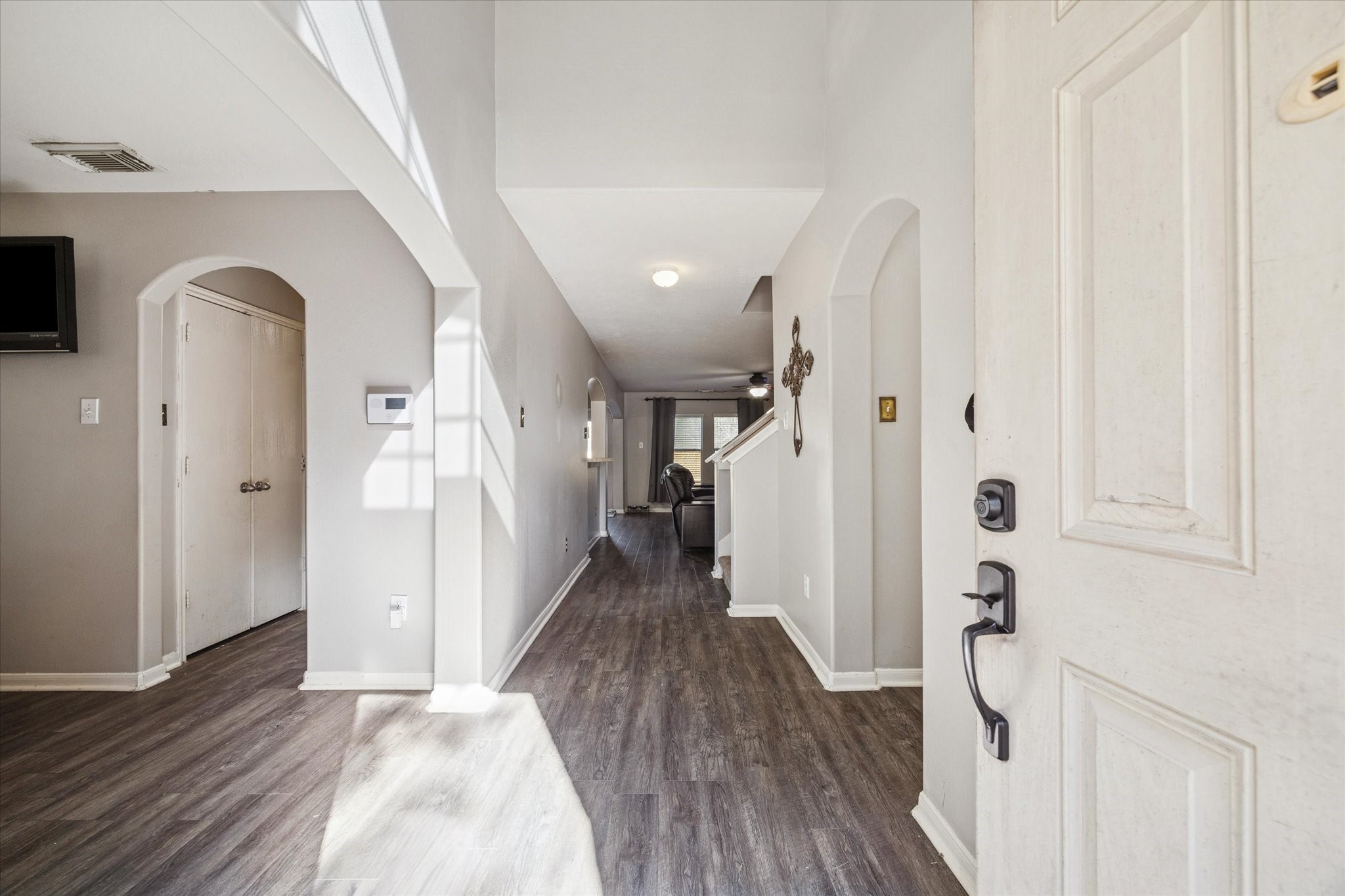 5243 El Tigre Lane Baytown, TX 77521 - Photo 4 of 29 a view of entryway with wooden floor