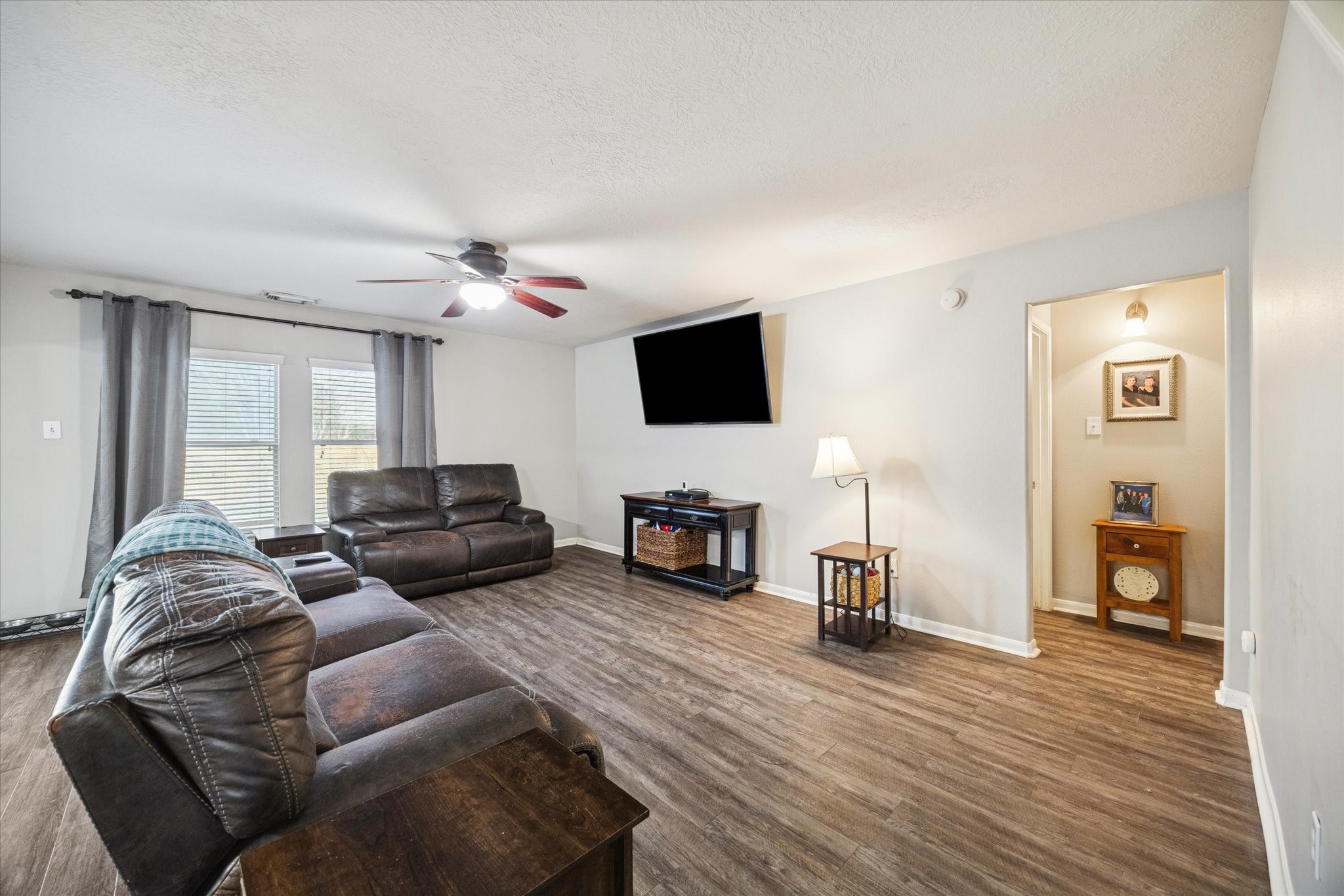 5243 El Tigre Lane Baytown, TX 77521 - Photo 9 of 29 a living room with furniture and a flat screen tv