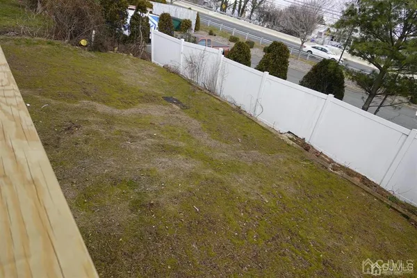 a view of balcony with wooden floor