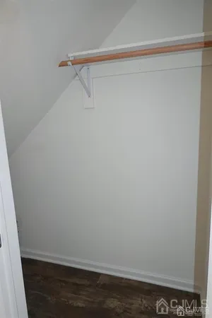 a view of small space with racks on the wall