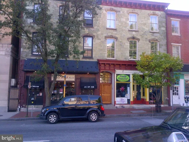 a car parked in front of a building