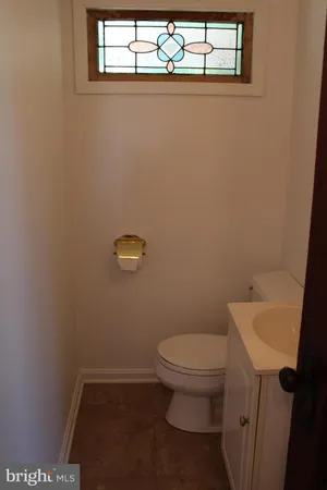 a bathroom with a toilet