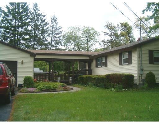 183 Lucerne Road Springfield, MA 01119 - Photo 3 of 20 a view of a house with a backyard