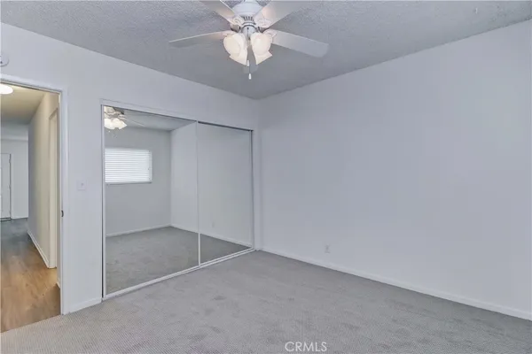 an empty room with a bathroom