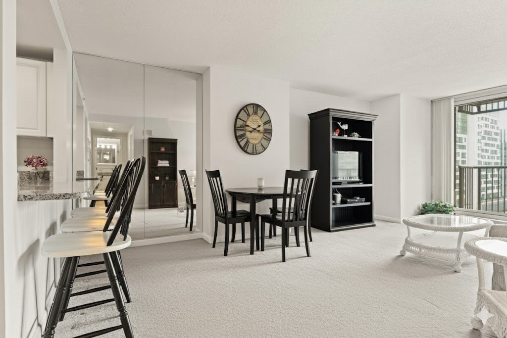 8 Museum Way, Unit 1103 Cambridge, MA 02141 - Photo 11 of 42 a view of a livingroom with furniture and entryway