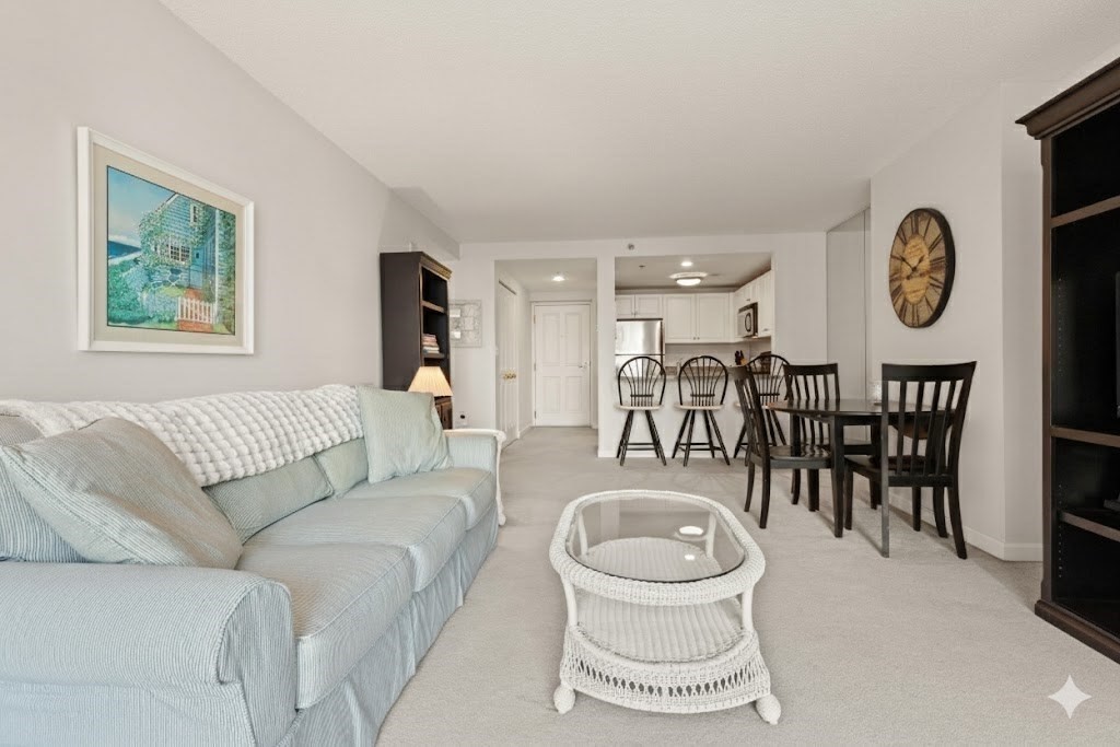 8 Museum Way, Unit 1103 Cambridge, MA 02141 - Photo 12 of 42 a living room with furniture and a large window