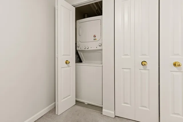 a bathroom with a shower and mirror