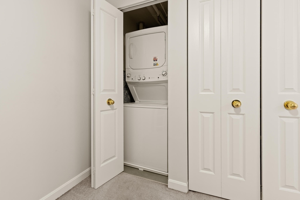 8 Museum Way, Unit 1103 Cambridge, MA 02141 - Photo 14 of 42 a bathroom with a shower and mirror