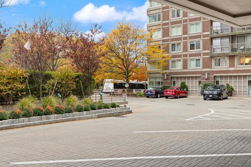8 Museum Way, Unit 1103 Cambridge, MA 02141 - Photo 24 of 42 a building with trees in front of it