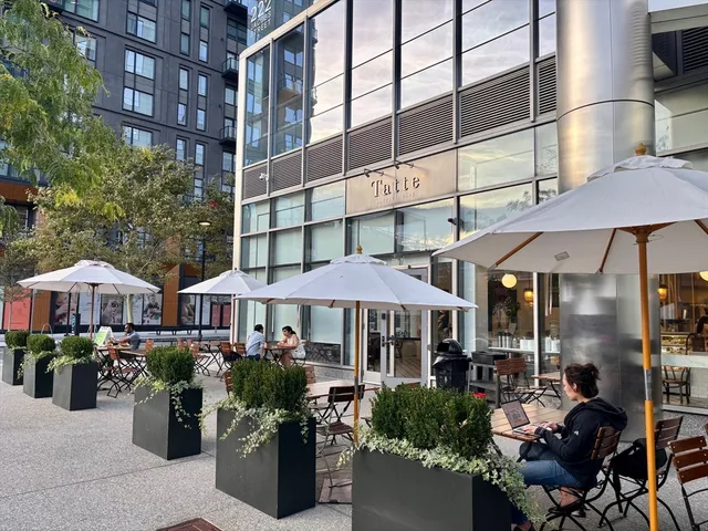 a view of street with sitting area