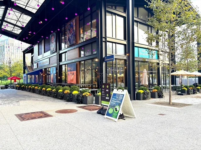 a view of street with sitting area