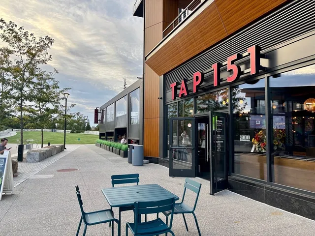 a front view of a building with a garage
