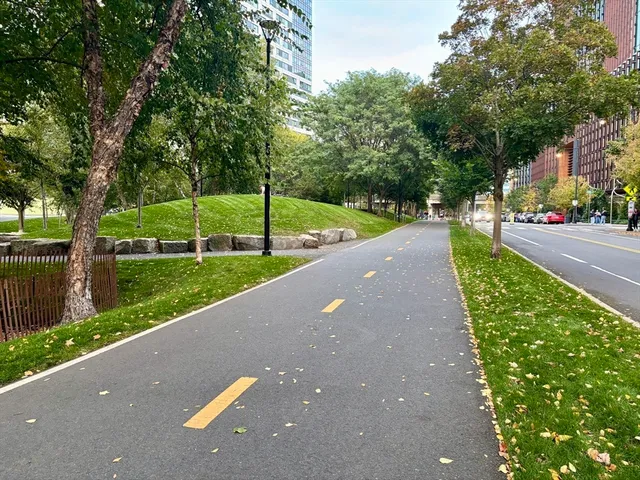a living room with lots of furniture and chandelier