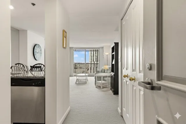 a view of a living room and dining room