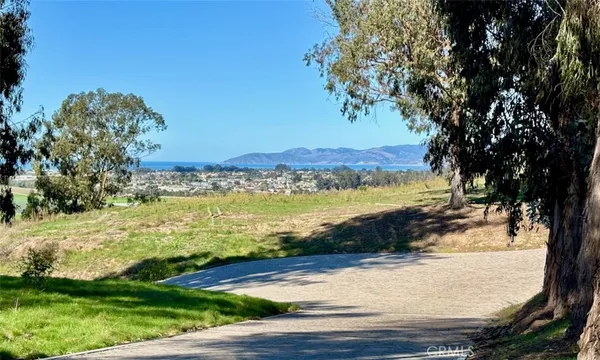 a view of a lake with a yard