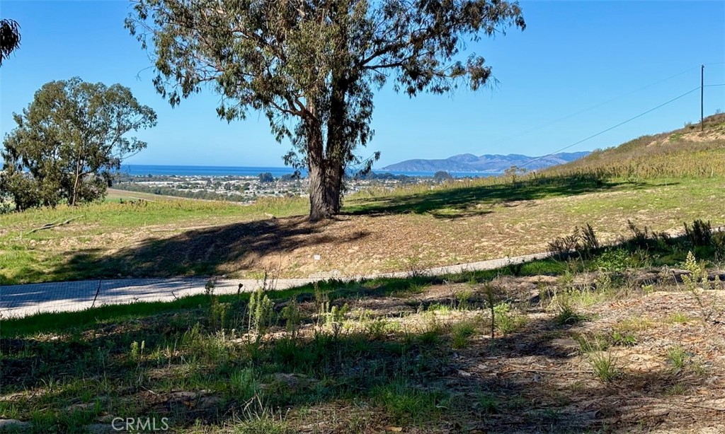 0 Castle Bluff Road Arroyo Grande, CA 93420 - Photo 7 of 38 a view of a lake with a yard