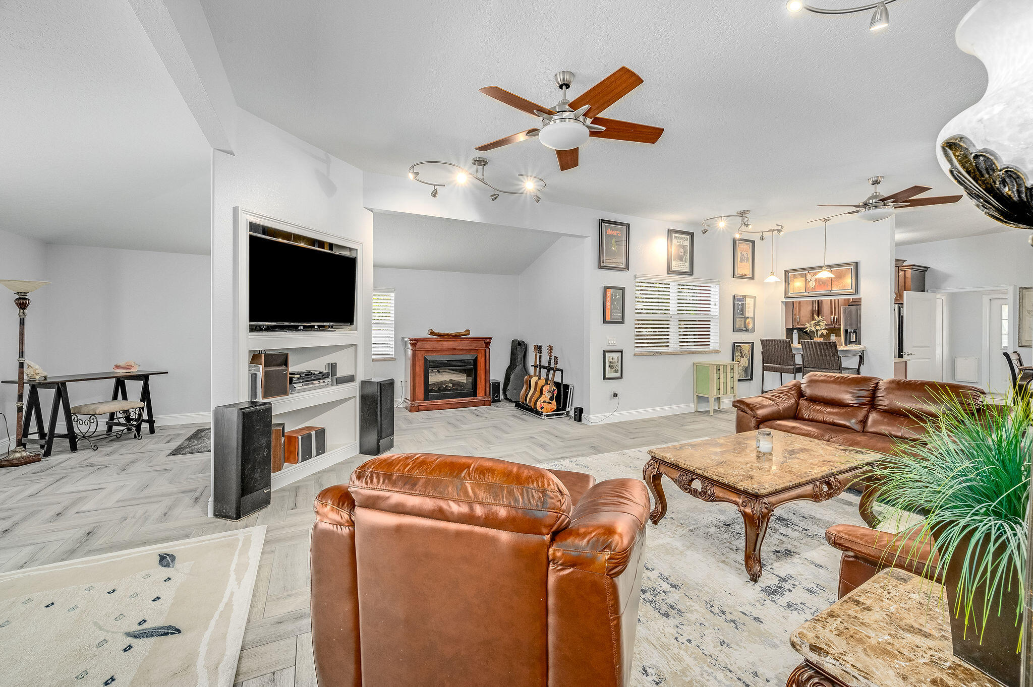 2100 Vernon Place Melbourne, FL 32901 - Photo 12 of 65 a living room with furniture and a flat screen tv