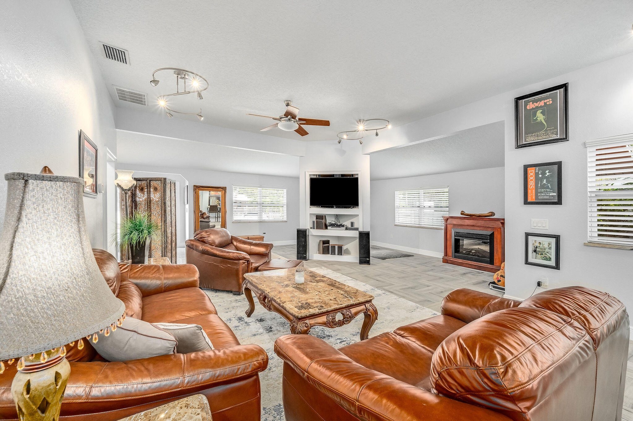2100 Vernon Place Melbourne, FL 32901 - Photo 17 of 65 a living room with furniture and flat screen tv