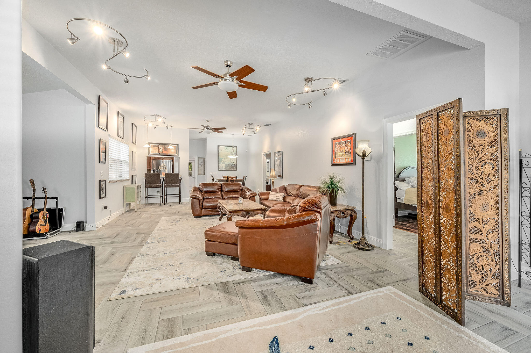 2100 Vernon Place Melbourne, FL 32901 - Photo 10 of 65 a living room with lots of furniture and a large window