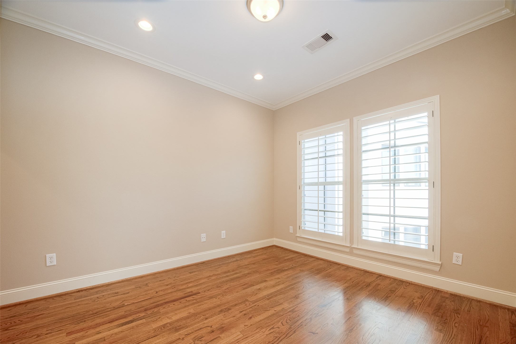 232 Detering Street, Unit A Houston, TX 77007 - Photo 24 of 46 Secondary Bedroom on Third Floor that Overlooks an adjacent Complex Main Area