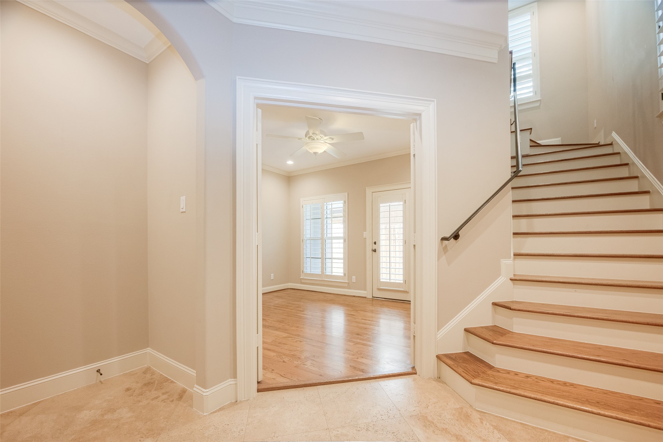 232 Detering Street, Unit A Houston, TX 77007 - Photo 8 of 46 First Floor as you walk in. Garage to Left, Storage Closet in Front, Bedroom with Ensuite Bath on First Floor, and Stairway leading to kitchen and living room.