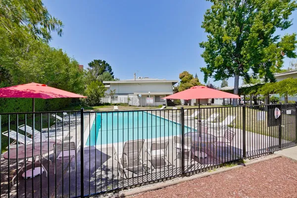 a view of a wrought iron fences in front of house