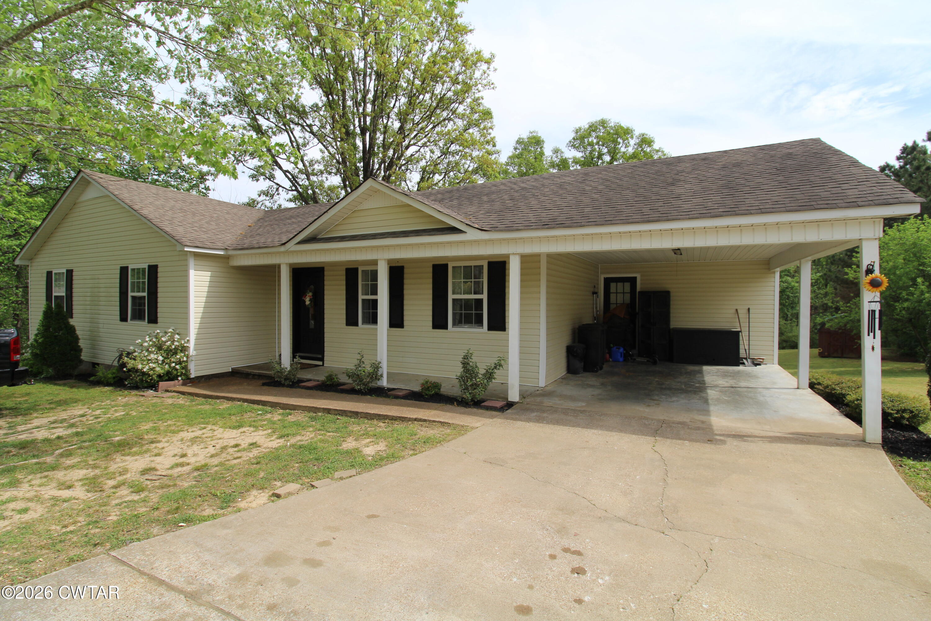 81 Monk Circle Lexington, TN 38351 - Photo 1 of 21 front view of a house with a patio