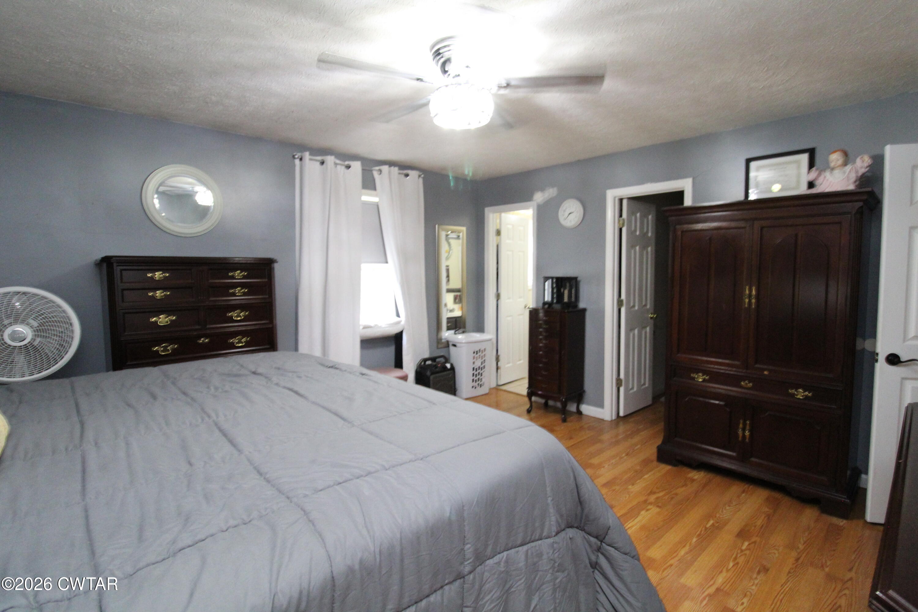 81 Monk Circle Lexington, TN 38351 - Photo 15 of 21 a bedroom with a bed and a dresser