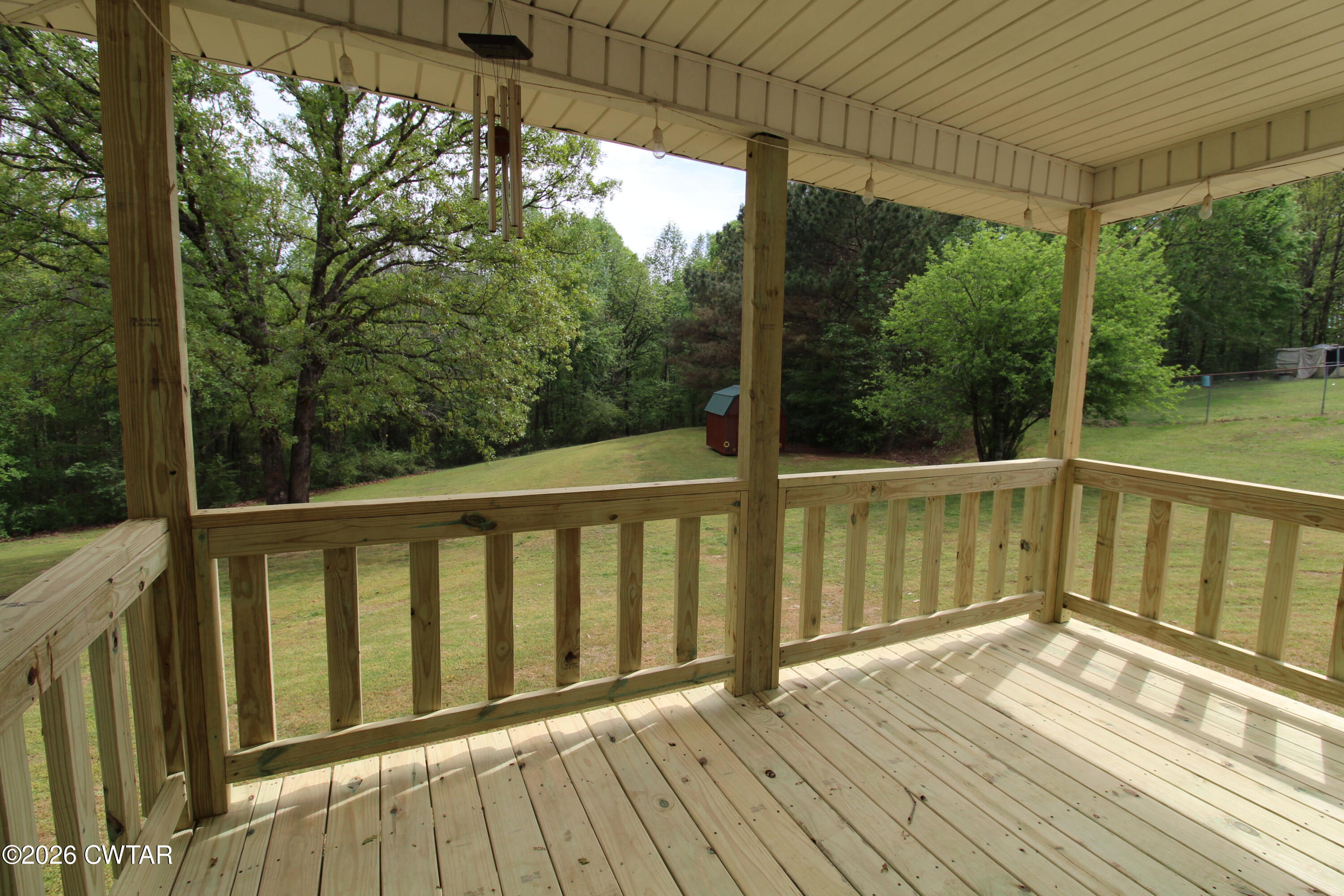 81 Monk Circle Lexington, TN 38351 - Photo 3 of 21 a view of balcony with wooden floor