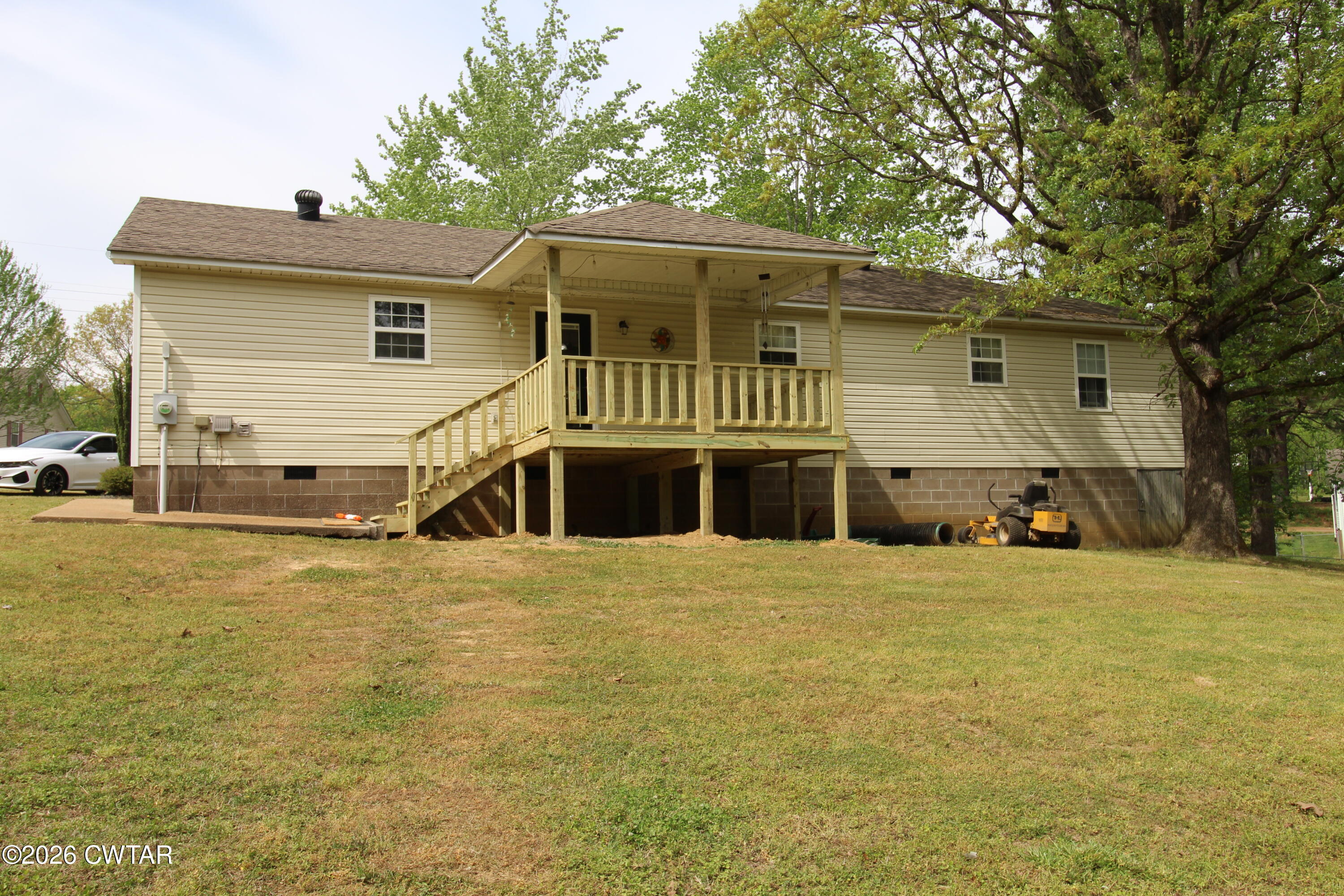 81 Monk Circle Lexington, TN 38351 - Photo 5 of 21 a front view of a house with a yard