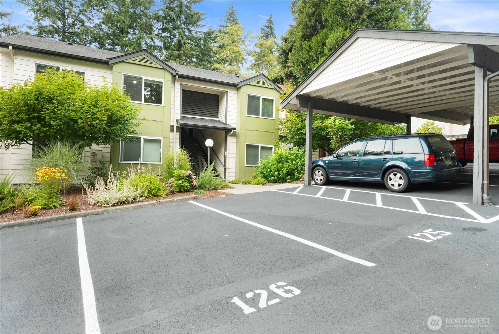 31500 33rd Place Southwest, Unit C203 Federal Way, WA 98023 - Photo 22 of 28 a view of a car parked in front of a house