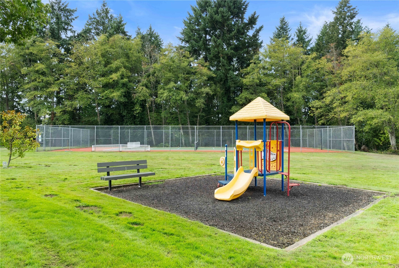 31500 33rd Place Southwest, Unit C203 Federal Way, WA 98023 - Photo 25 of 28 a view of a park with slide