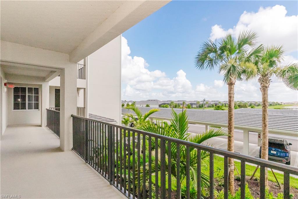 5583 Double Eagle Circle, Unit 4125 Ave Maria, FL 34142 - Photo 12 of 36 a view of a balcony with lake view