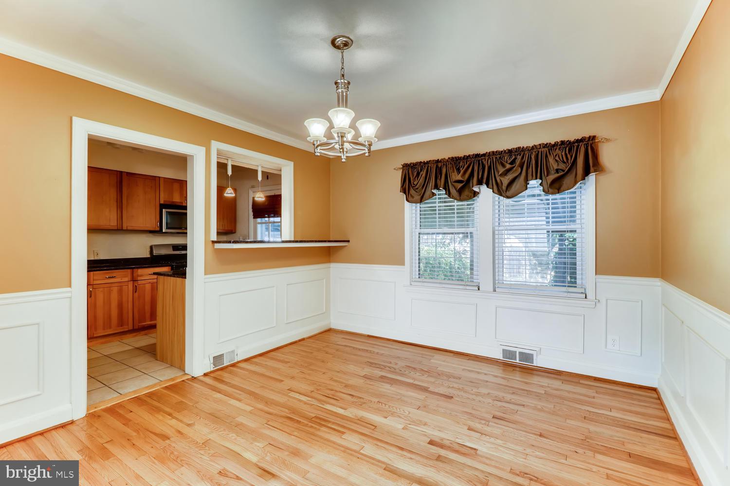 1847 Loch Shiel Road Towson, MD 21286 - Photo 9 of 37 Formal dining room with Breakfast bar for seating