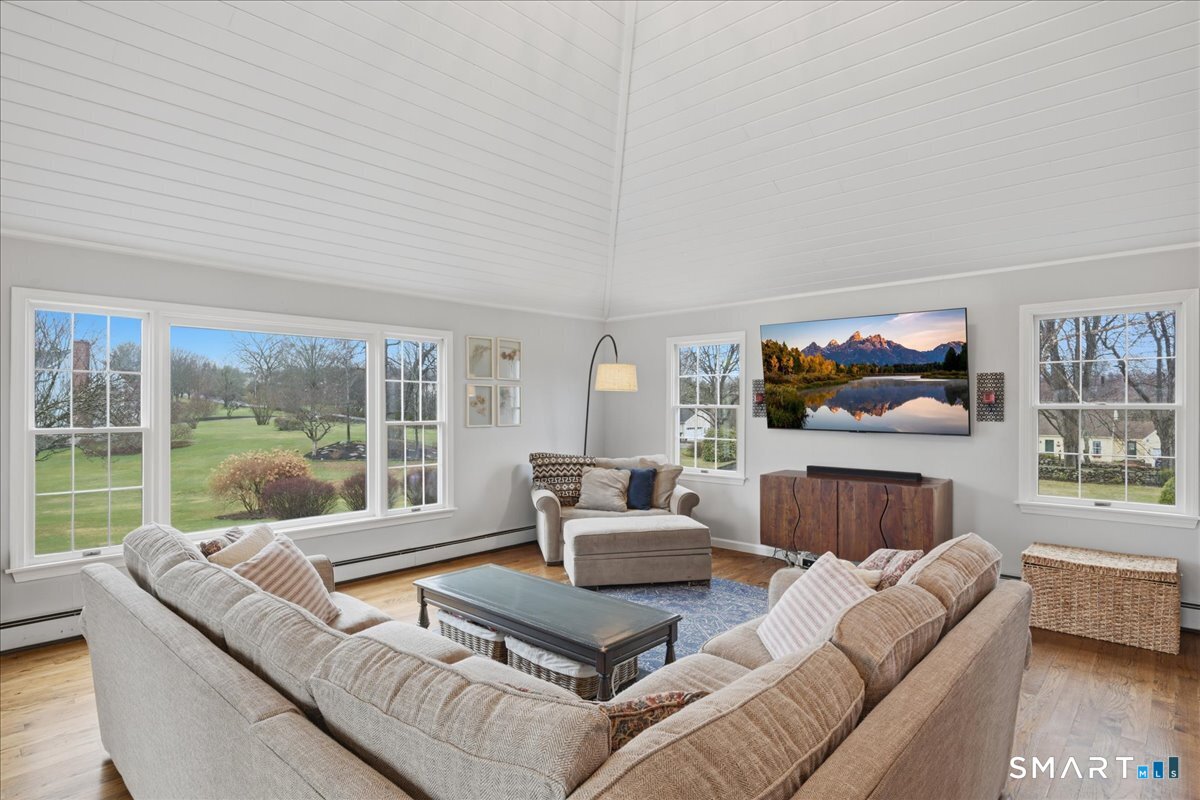 792 Wrights Crossing Road Pomfret, CT 06259 - Photo 25 of 40 a living room with furniture and a large window