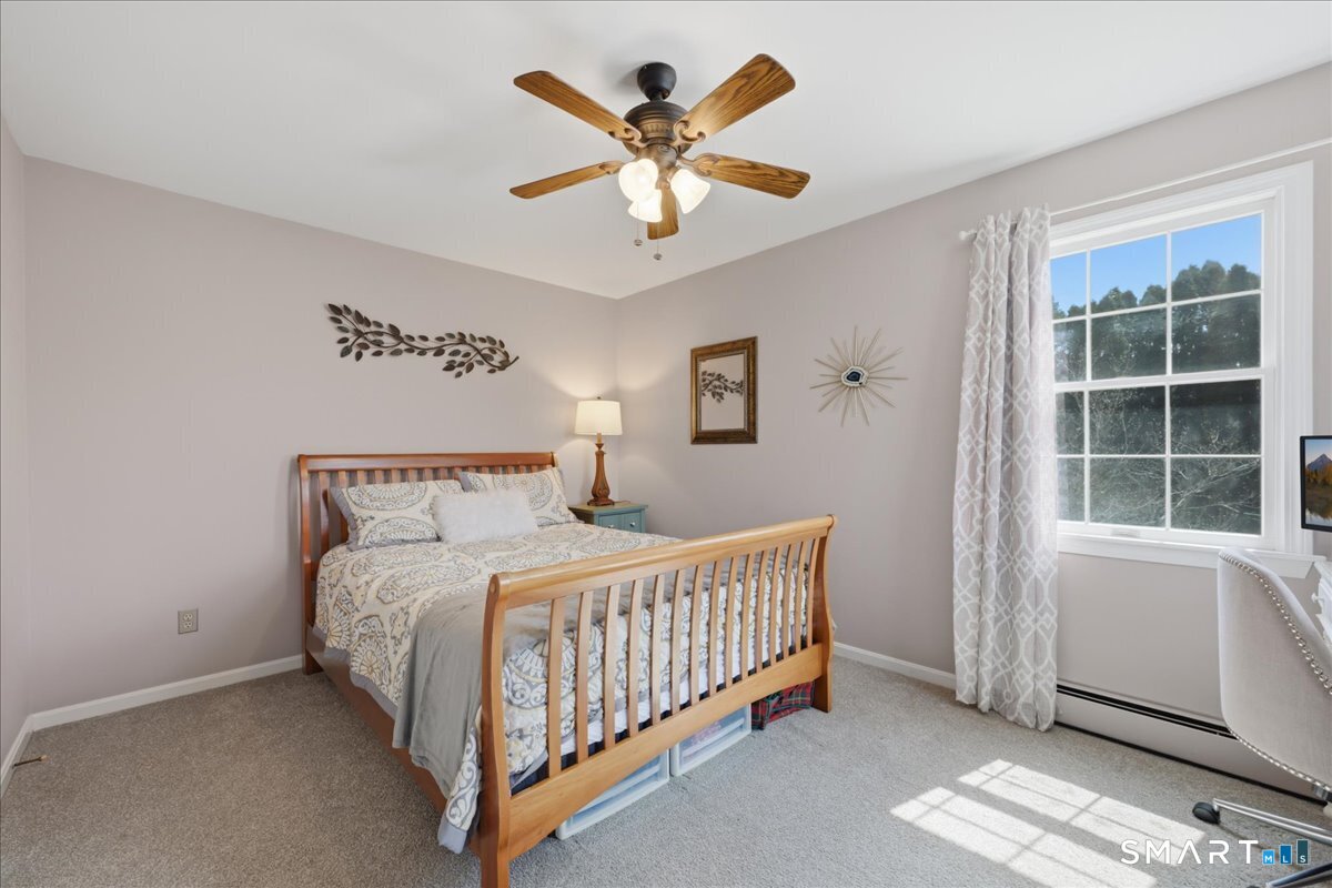 792 Wrights Crossing Road Pomfret, CT 06259 - Photo 35 of 40 a bedroom with a bed and window