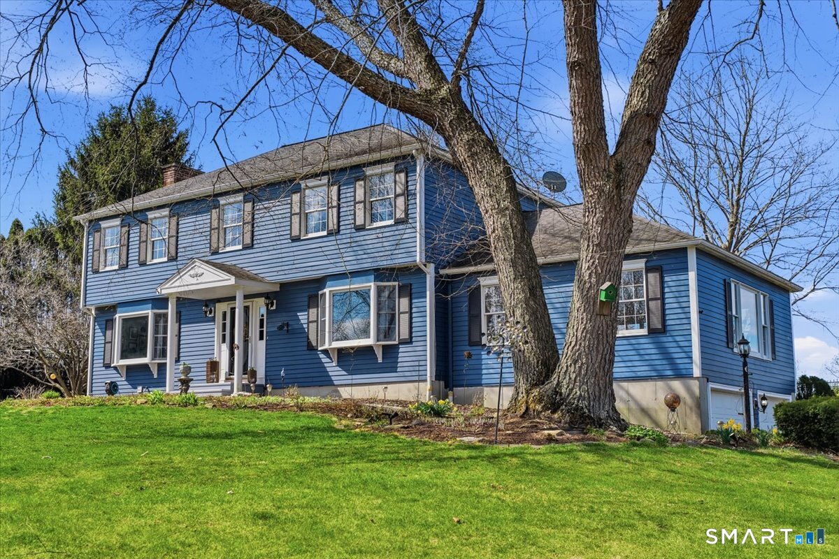 792 Wrights Crossing Road Pomfret, CT 06259 - Photo 7 of 40 a front view of a house with a yard