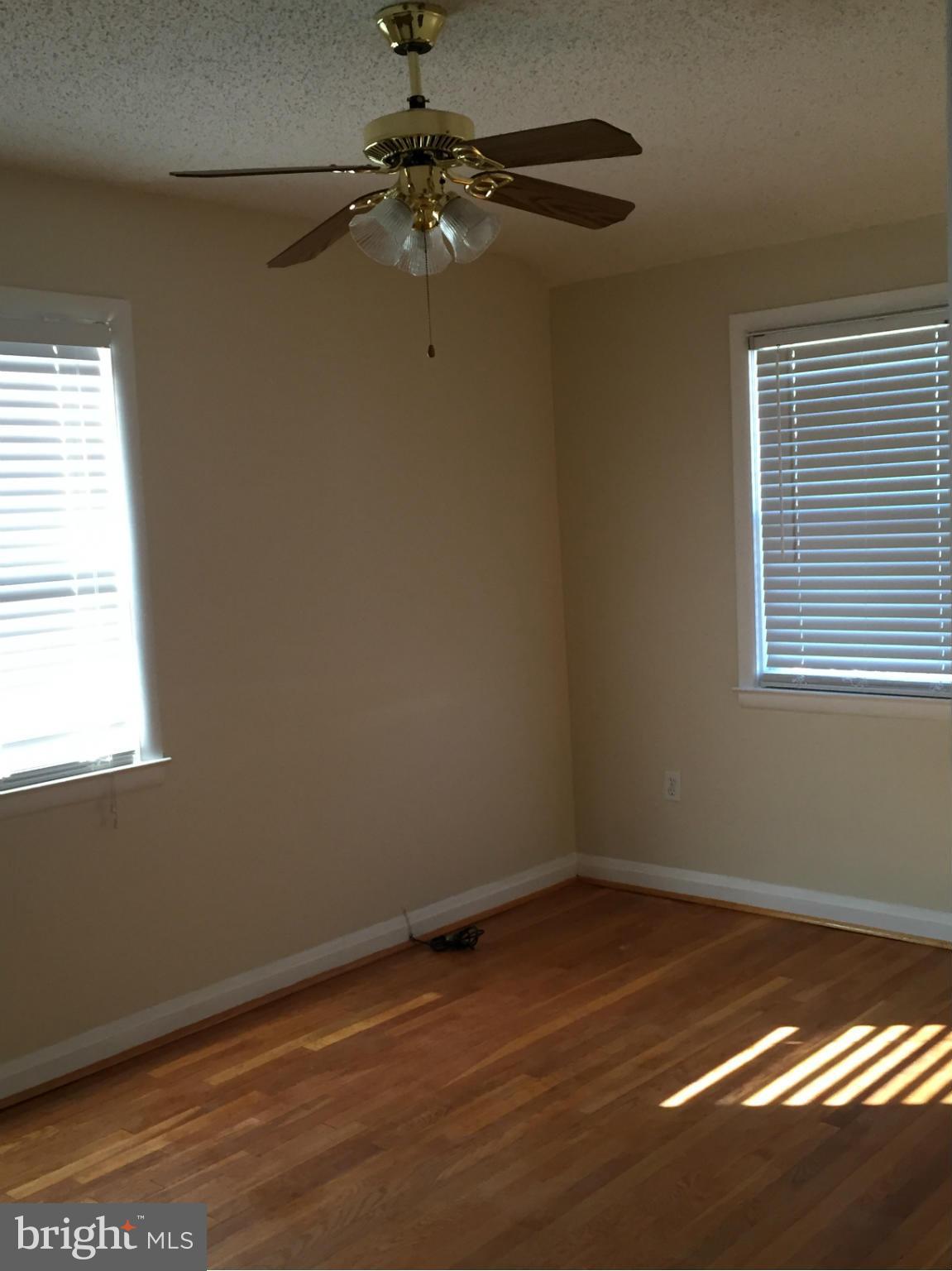 6127 Marlora Road Baltimore, MD 21239 - Photo 13 of 27 a view of a room that has a window in it