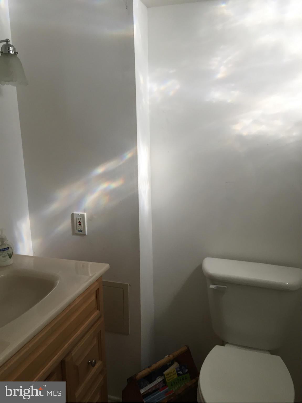 6127 Marlora Road Baltimore, MD 21239 - Photo 25 of 27 a bathroom with a toilet and a sink
