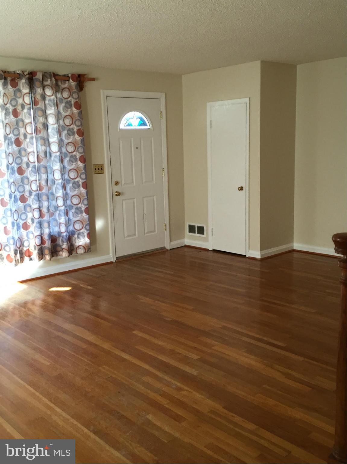 6127 Marlora Road Baltimore, MD 21239 - Photo 5 of 27 wooden floor in a room